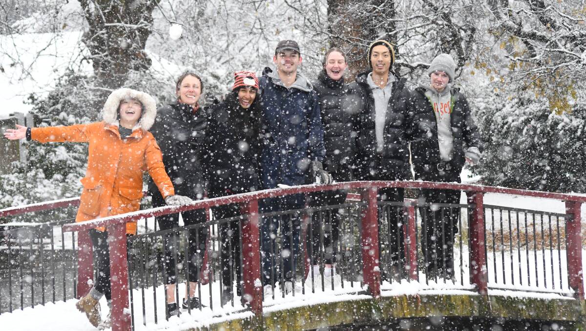 Jiyoon Lee, Izzy Nilsson, Trisha Narula, Dominic Cooper, Anna Penfold, Jerry Yu, Kieran Cook during the June, 2021 snowfall at Cook Park. Picture by Jude Keogh.