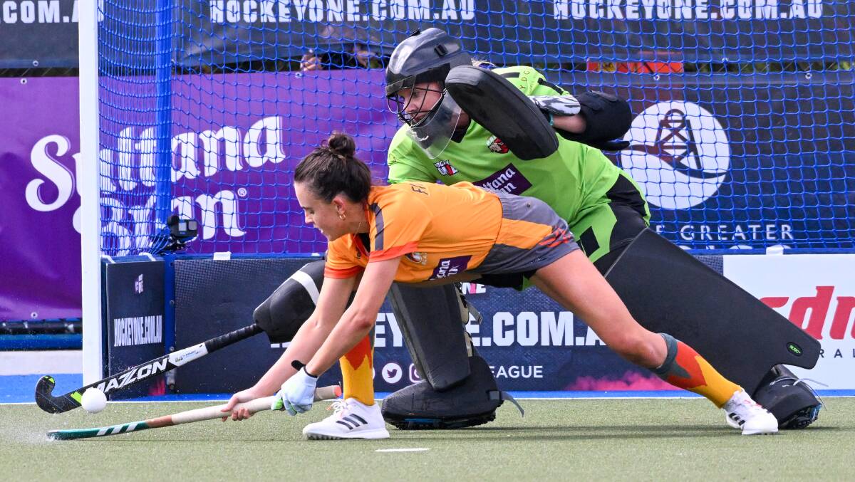 NSW Pride goal-keeper Jocelyn Bartram attempts to block a shot. 